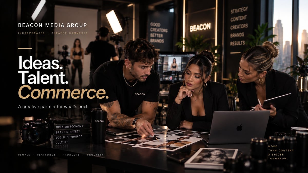 Beacon Media Group office: three professionals review work on tablet with modern interior and city view backdrop